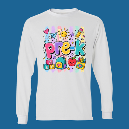 A white long-sleeve t-shirt with a colorful 'Pre-K' school-themed graphic on the chest, displayed against a solid blue background.