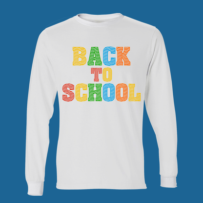 A white long-sleeve t-shirt with a colorful 'BACK TO SCHOOL' graphic printed on the chest, displayed against a solid blue background.