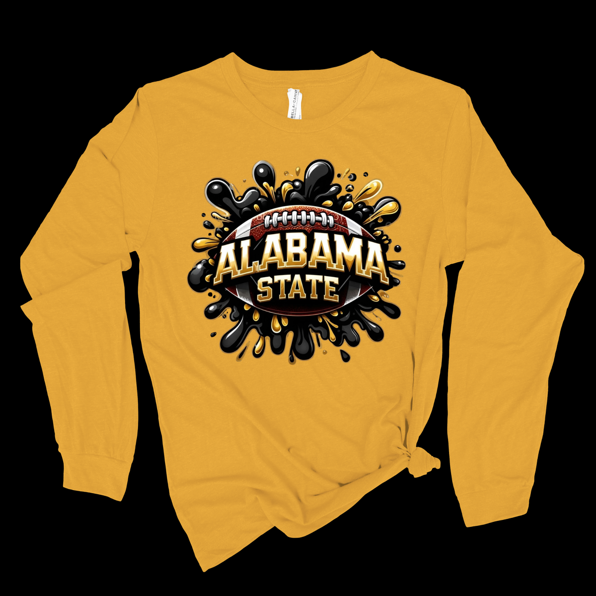 A long-sleeve t-shirt in a golden yellow color, featuring a 'Hornet Nation' graphic with a hornet mascot on the chest. The shirt is styled with a knot at the bottom right hem against a solid black background.