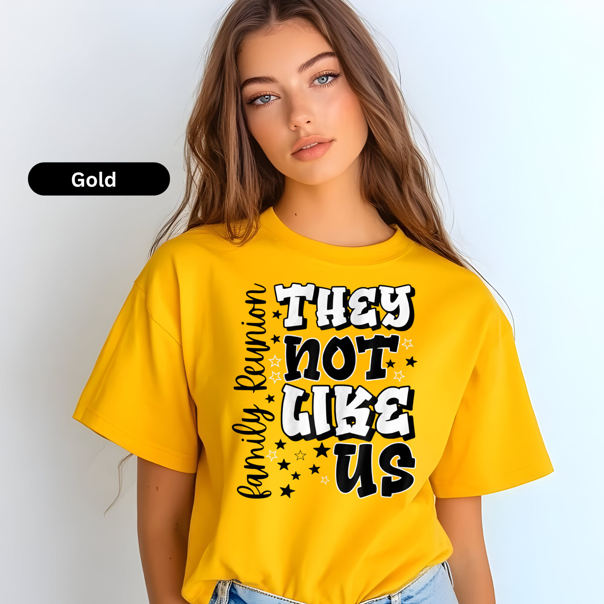Person wearing a yellow t-shirt with text, standing against a light background