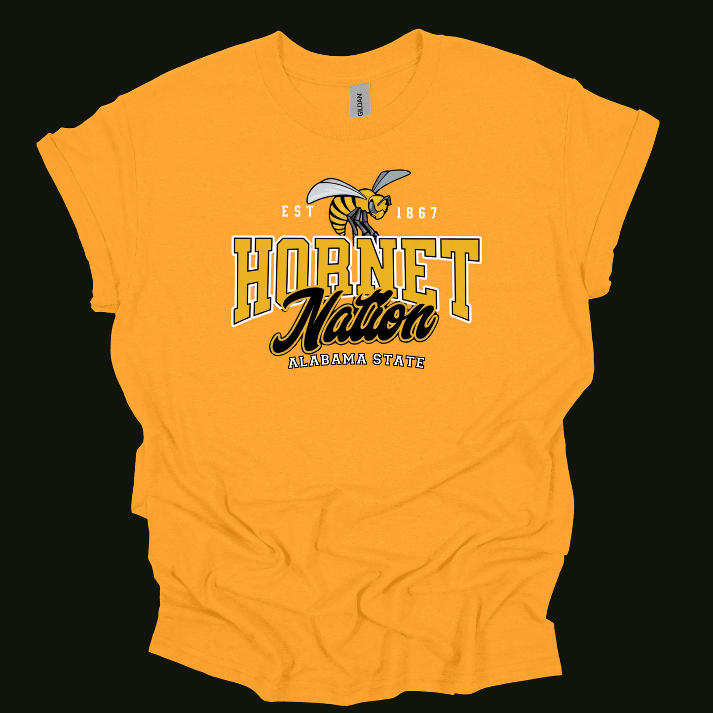 A bright yellow short-sleeve t-shirt with a 'Hornet Nation' Alabama State Hornets graphic on the front, displayed against a solid black background.