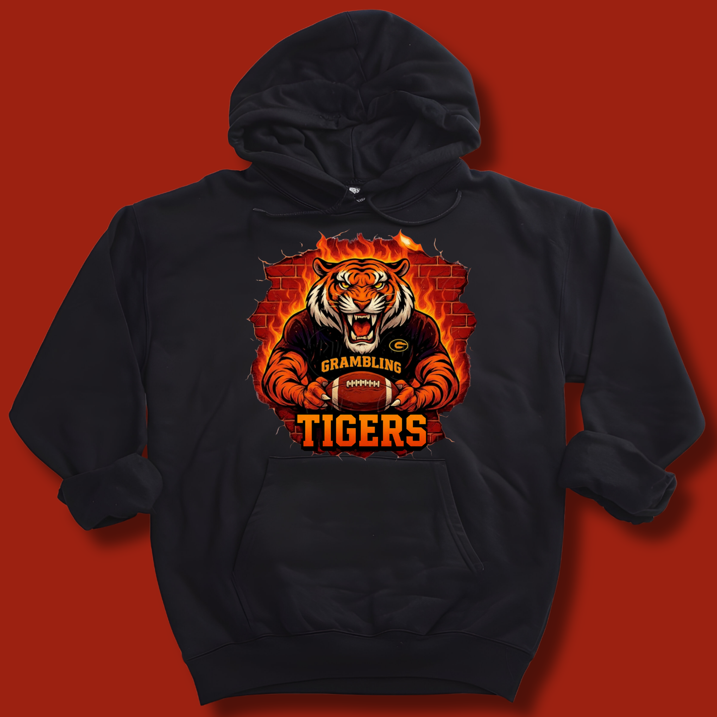 Black hoodie with a tiger graphic and 'Grambling Tigers' text on a red background