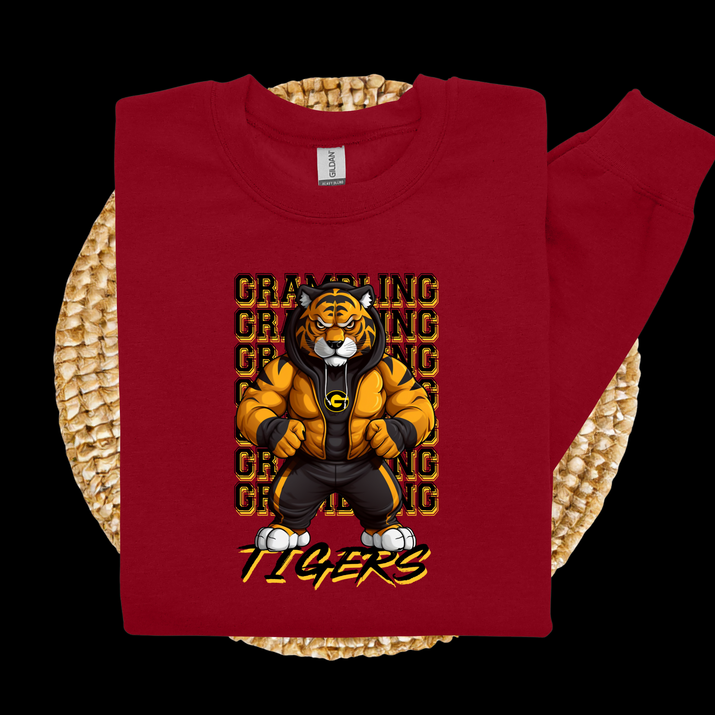 Red sweatshirt with a tiger graphic and text on a woven surface