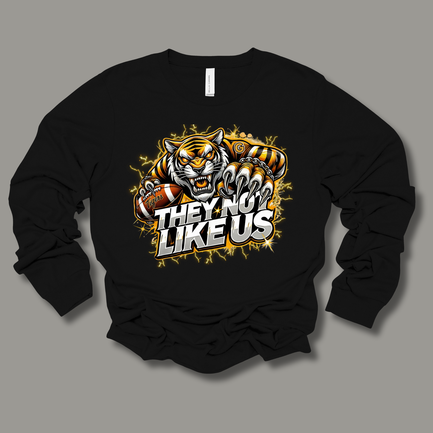 Black long-sleeve shirt with a tiger graphic and text on a gray background