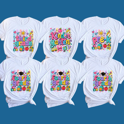 Six white graphic T-shirts arranged in two rows on a teal background, each printed with colorful school-themed text: PRE-K, FIRST Grade, KINDER Garden, BACK TO SCHOOL, FOURTH Grade, and BACK TO SCHOOL.