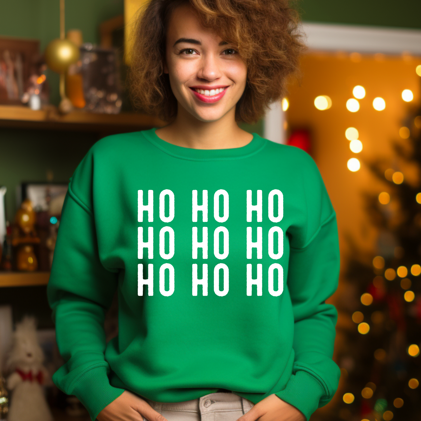 Person wearing a green sweater with 'HO HO HO' text in a festive indoor setting.