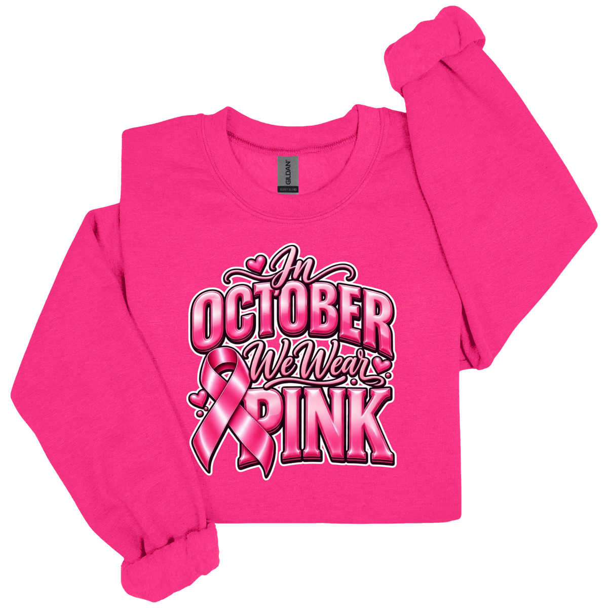 A bright pink long-sleeve crewneck sweatshirt with a graphic on the front reading 'In October We Wear Pink' in stylized lettering with a pink ribbon, shown on a plain white background.