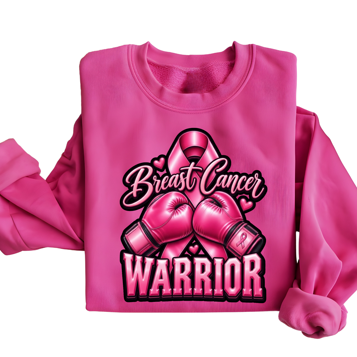 A folded bright pink sweatshirt with a large graphic on the front featuring a pink breast ribbon, boxing gloves, the words 'Breast Cancer WARRIOR,' and small heart details, shown on a plain white background.