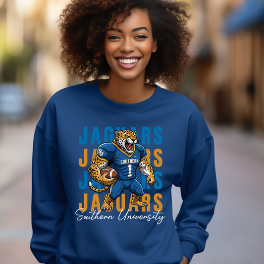 Person wearing a blue sweatshirt with a jaguar graphic and 'Southern University' text. Southern Jaguars Sweatshirt: HBCU Game Day Football Cozy Sweater