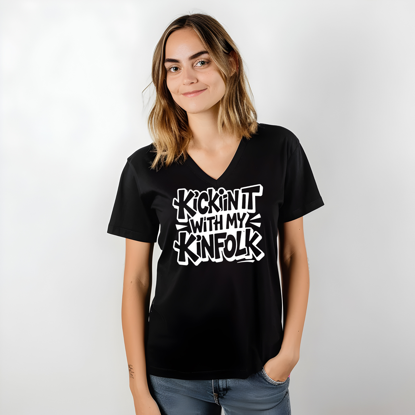 Person wearing a black t-shirt with white text on a plain background