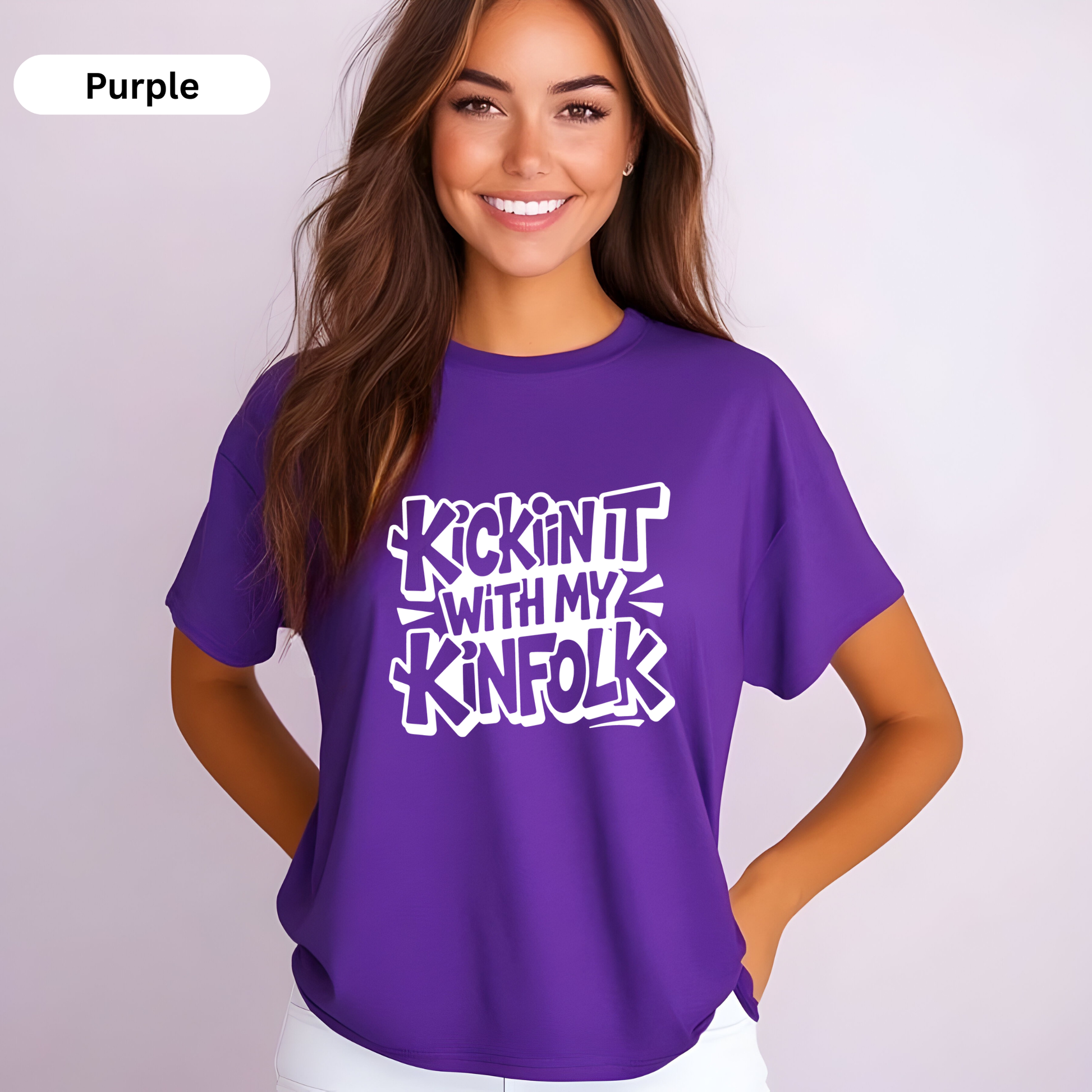Woman wearing a purple t-shirt with text on a plain background