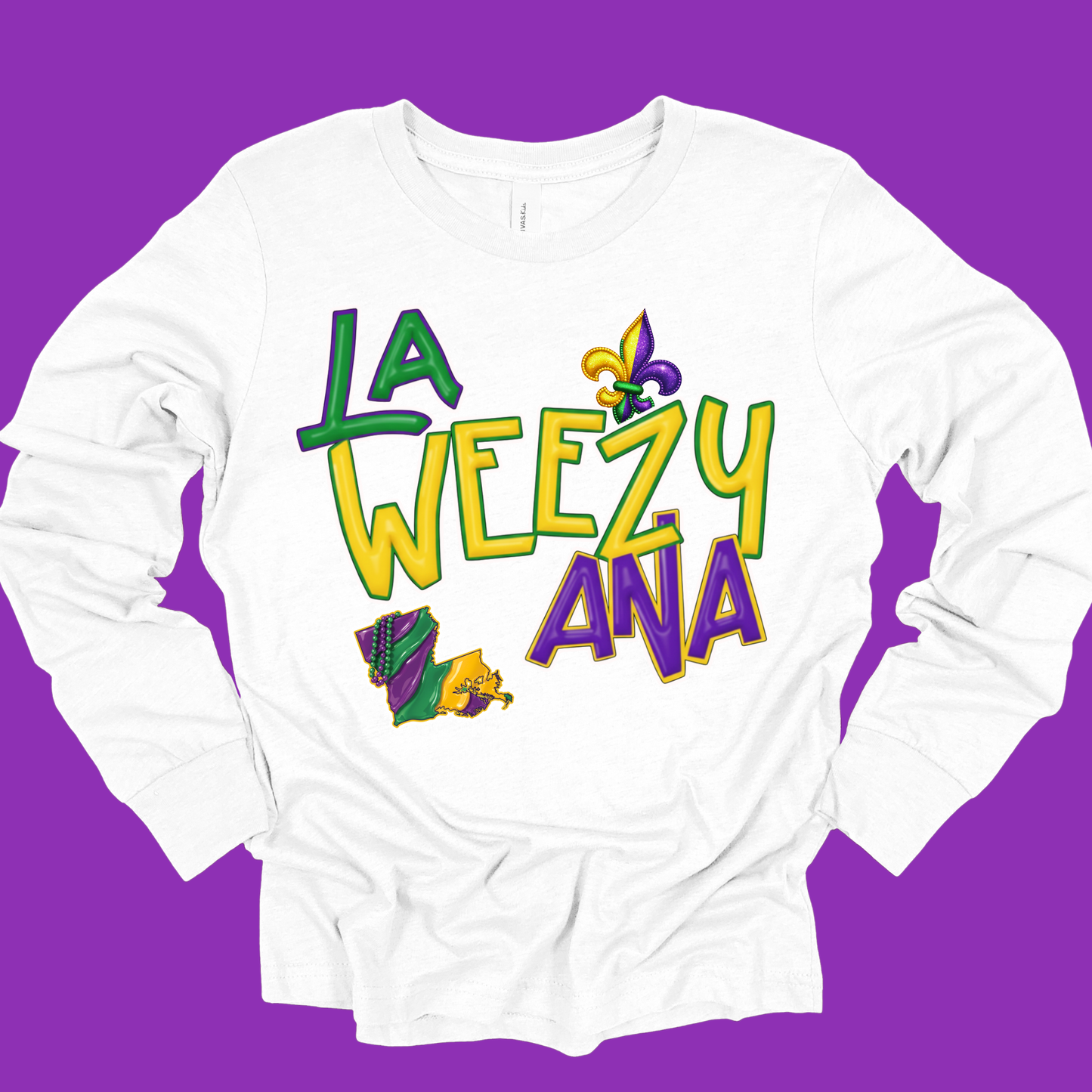White long-sleeve shirt with colorful text and Mardi Gras-themed graphics on a purple background