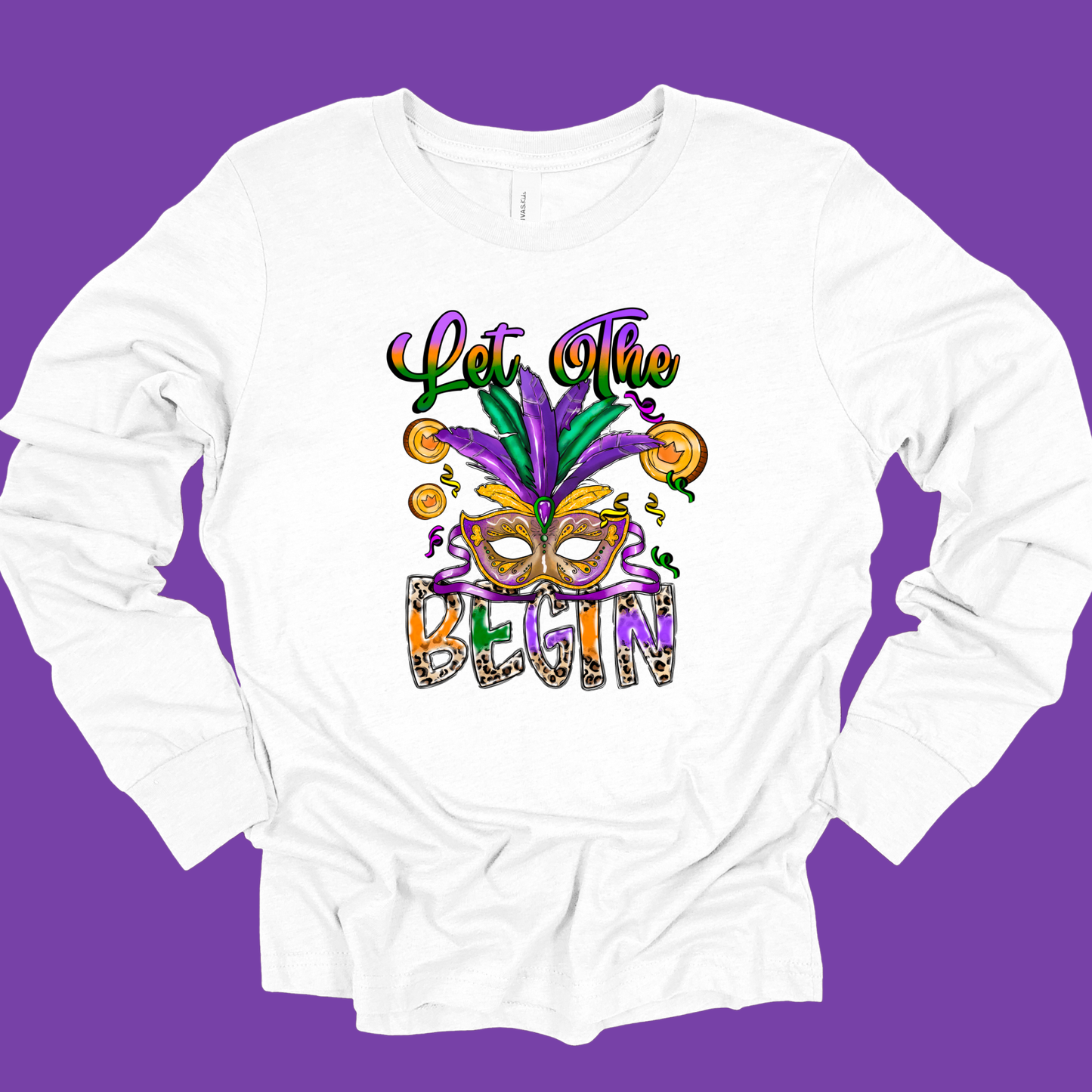 White long-sleeve shirt with Mardi Gras-themed design on a purple background