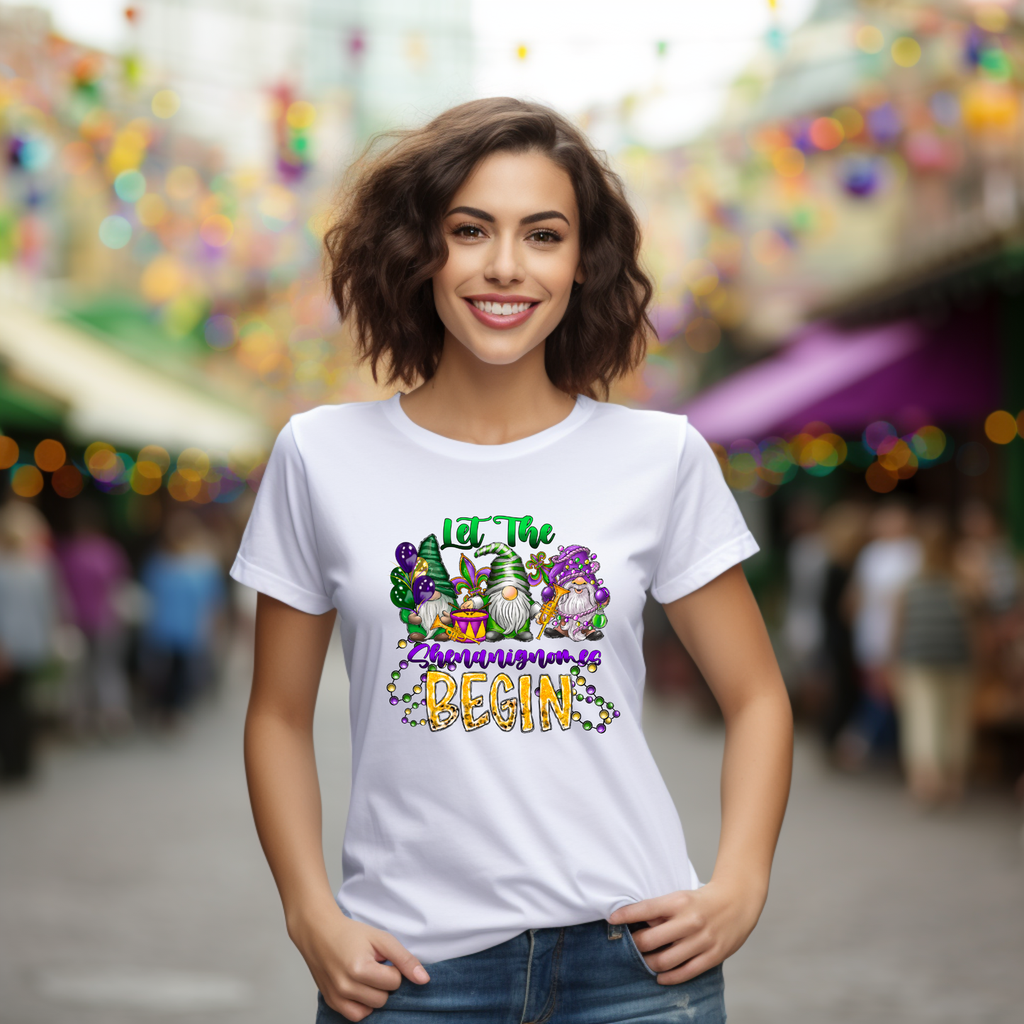 Woman wearing a white t-shirt with colorful text and graphics in an outdoor setting.