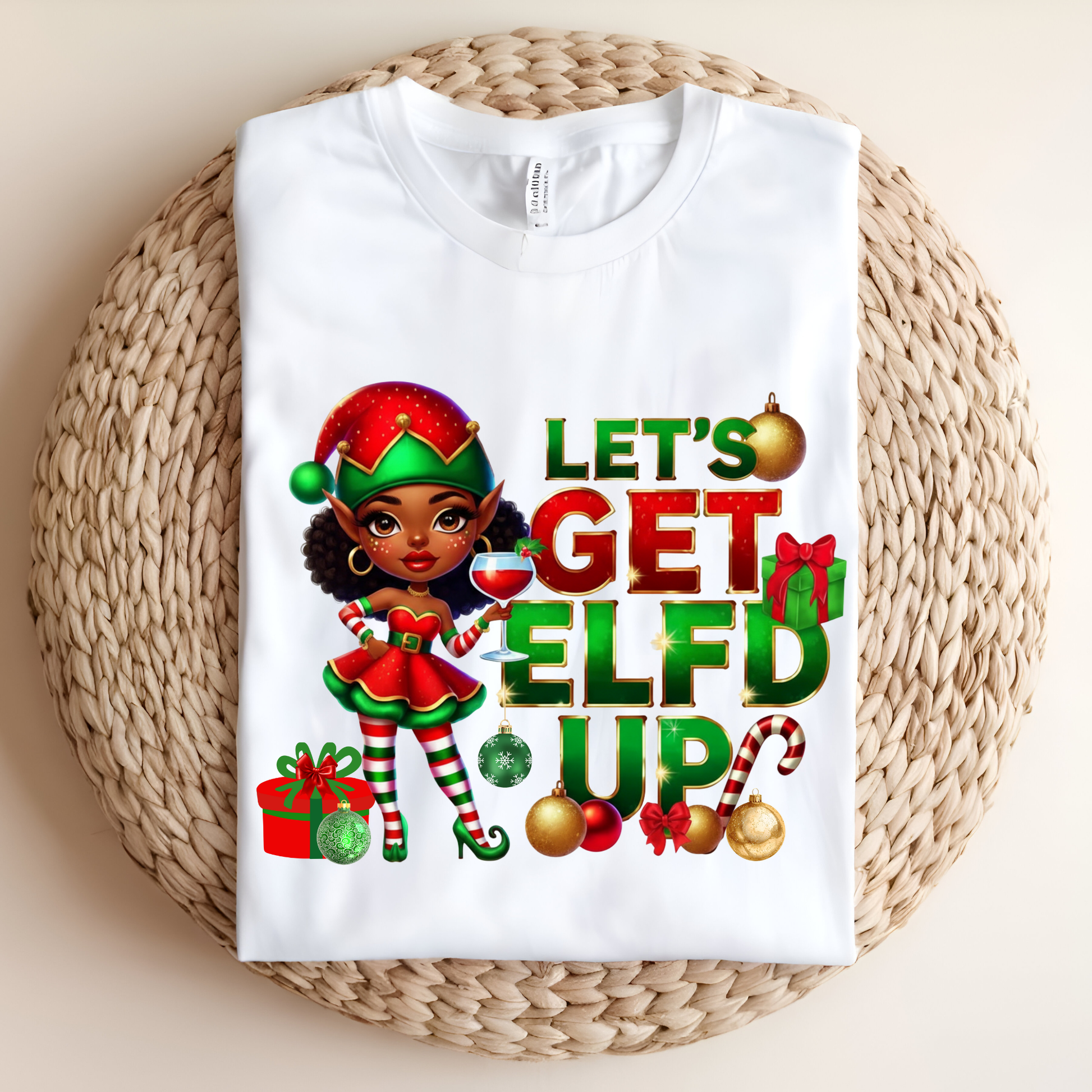 White sweatshirt with Christmas-themed design featuring a character and text on a woven surface.