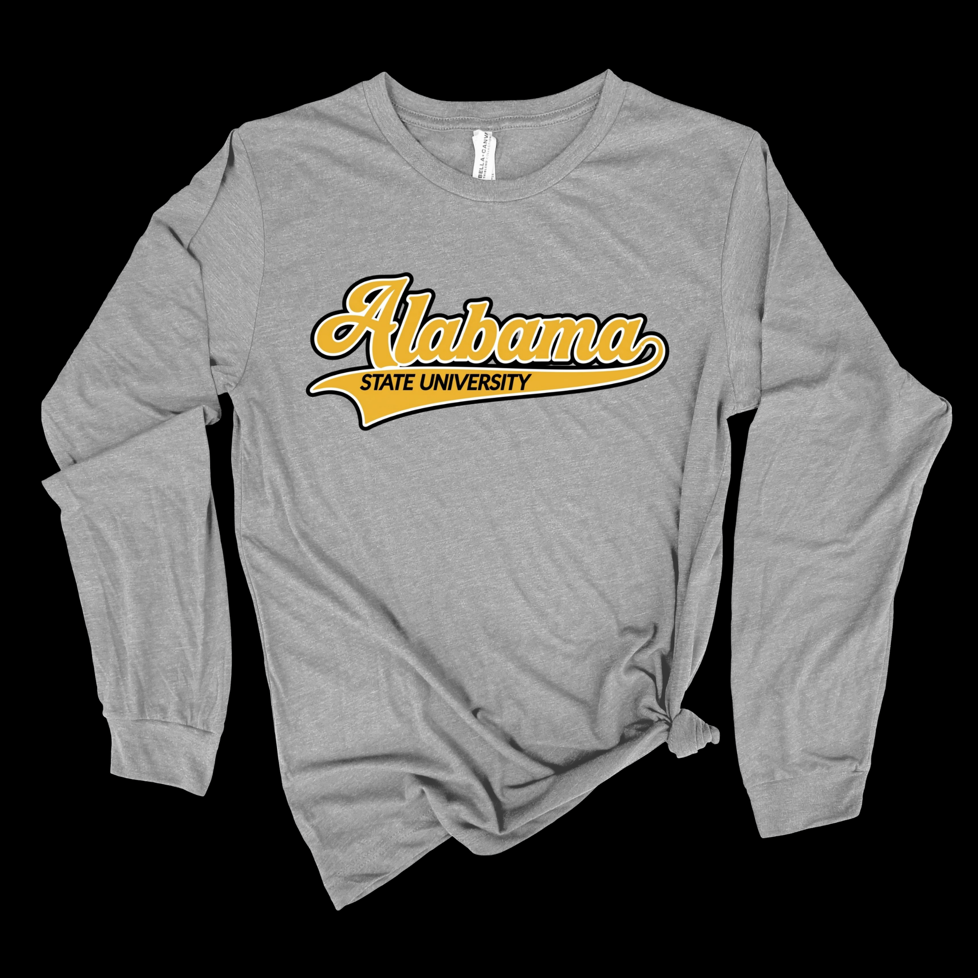 A heather gray long-sleeve t-shirt with 'Alabama State University' printed in yellow and white across the chest, styled with a knot at the bottom hem against a black background.