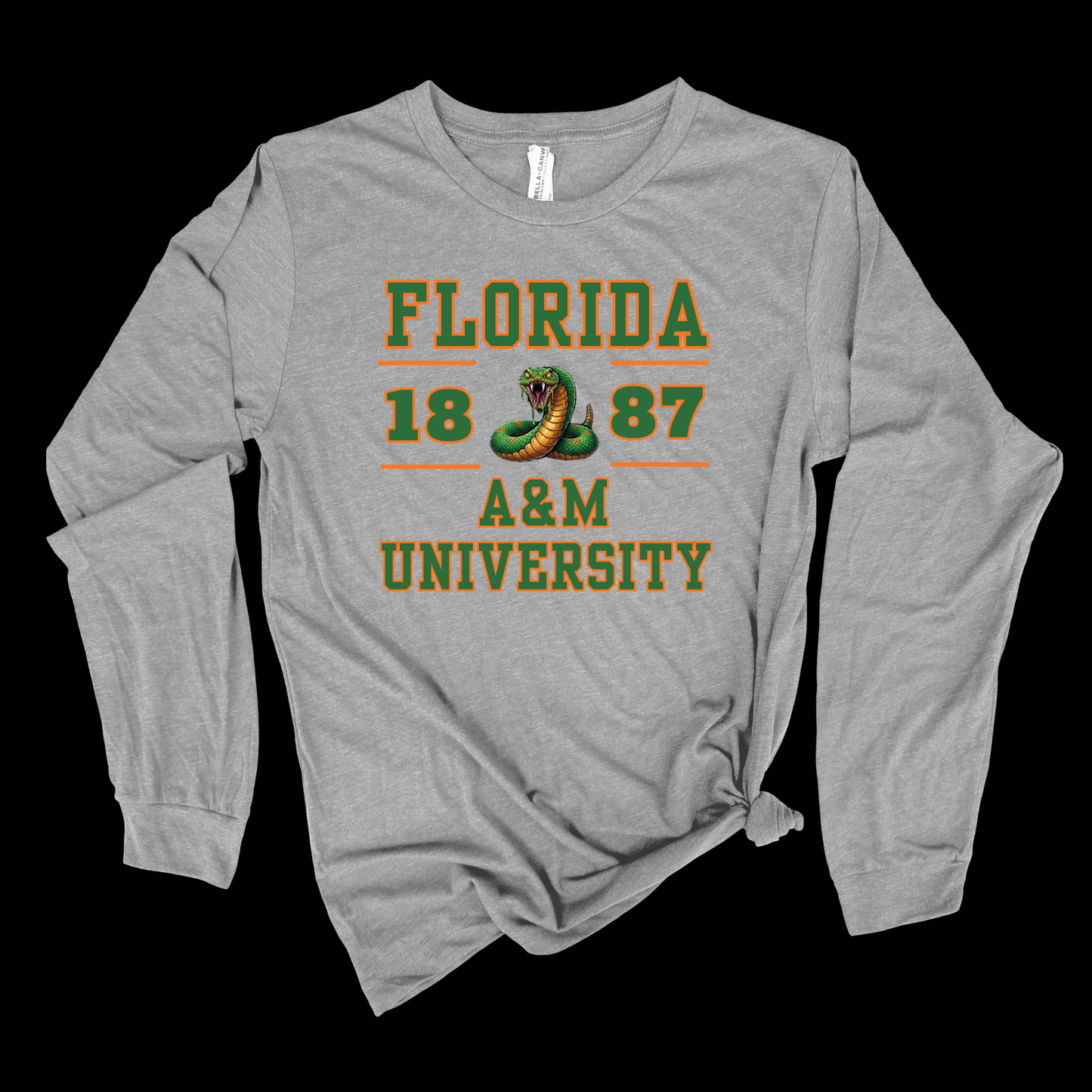 A heather gray long-sleeve t-shirt with a distressed green and orange graphic reading 'FLORIDA 1887 A&M UNIVERSITY' with a snake illustration, shown on a solid black background.