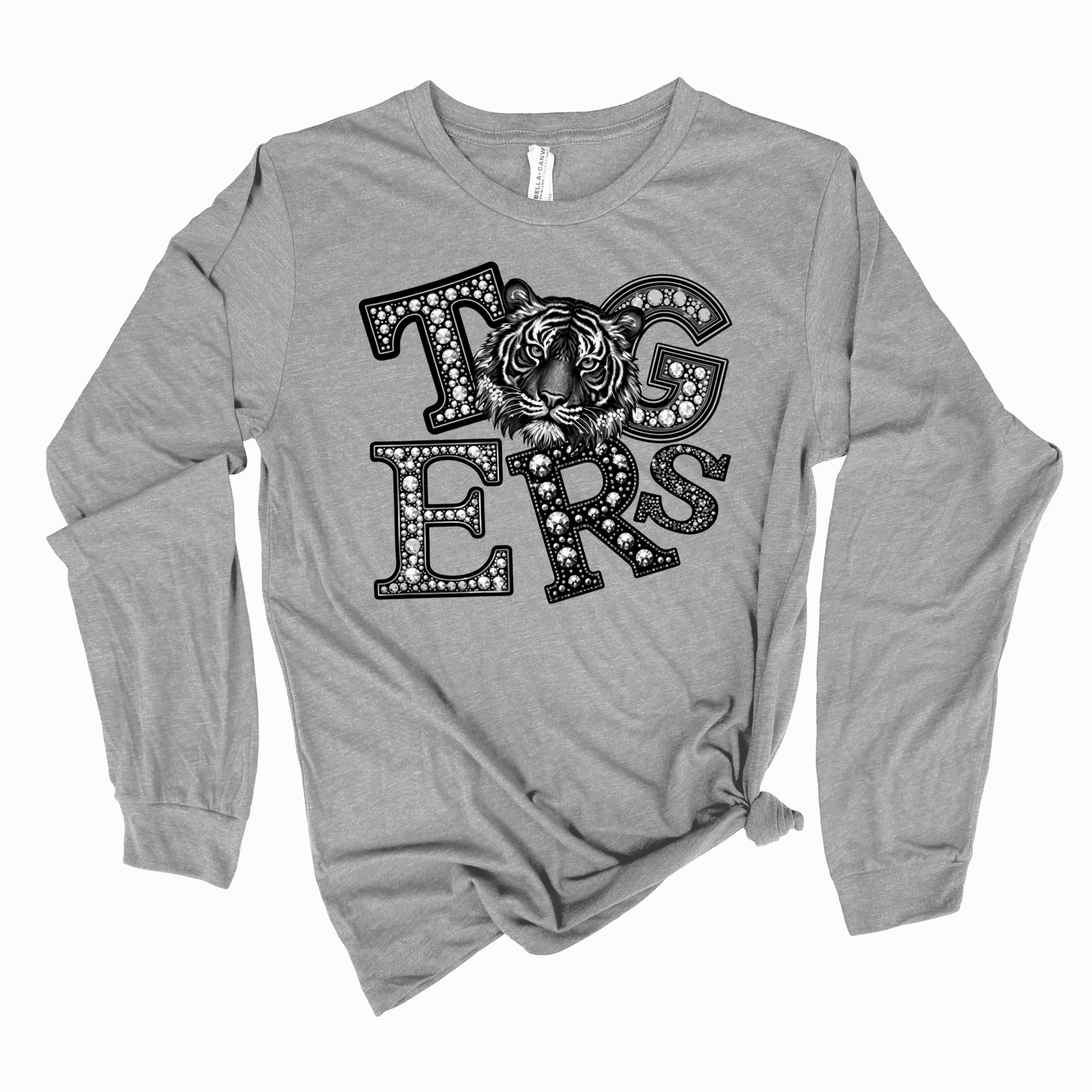 A heather gray long-sleeve t-shirt with a distressed black graphic reading 'TUGS ERS' featuring a tiger design inside the letters, shown on a plain white background.