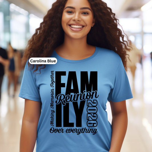 Person wearing a blue t-shirt with 'FAM Reunion 2026' text in a blurred indoor setting