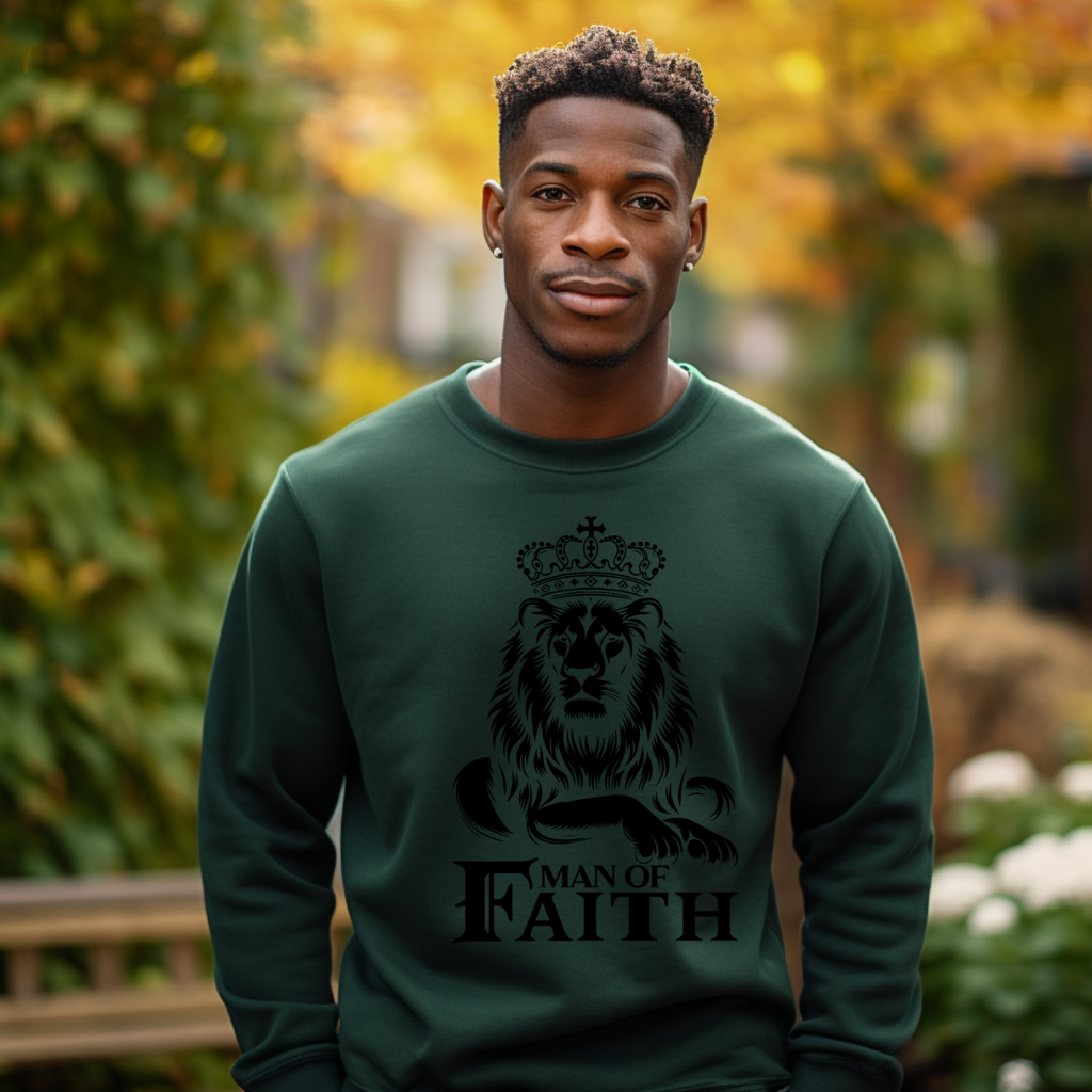 Man wearing a forest green 'Man of Faith' sweatshirt with a gold Lion of Judah graphic, surrounded by people in an outdoor autumn setting. Christian faith  and Religious Men's Sweater apparel
