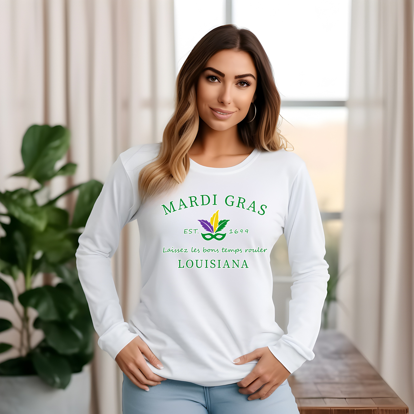 Woman wearing a white long-sleeve shirt with Mardi Gras Louisiana text and logo.