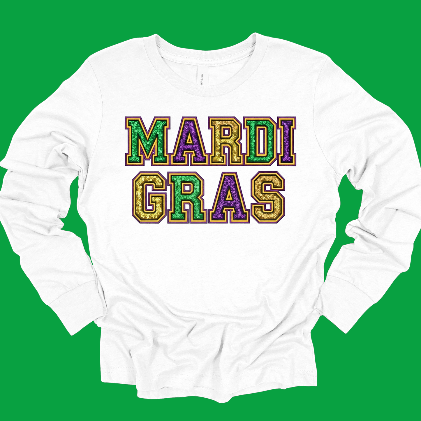 White long-sleeve shirt with colorful 'MARDI GRAS' text on a green background