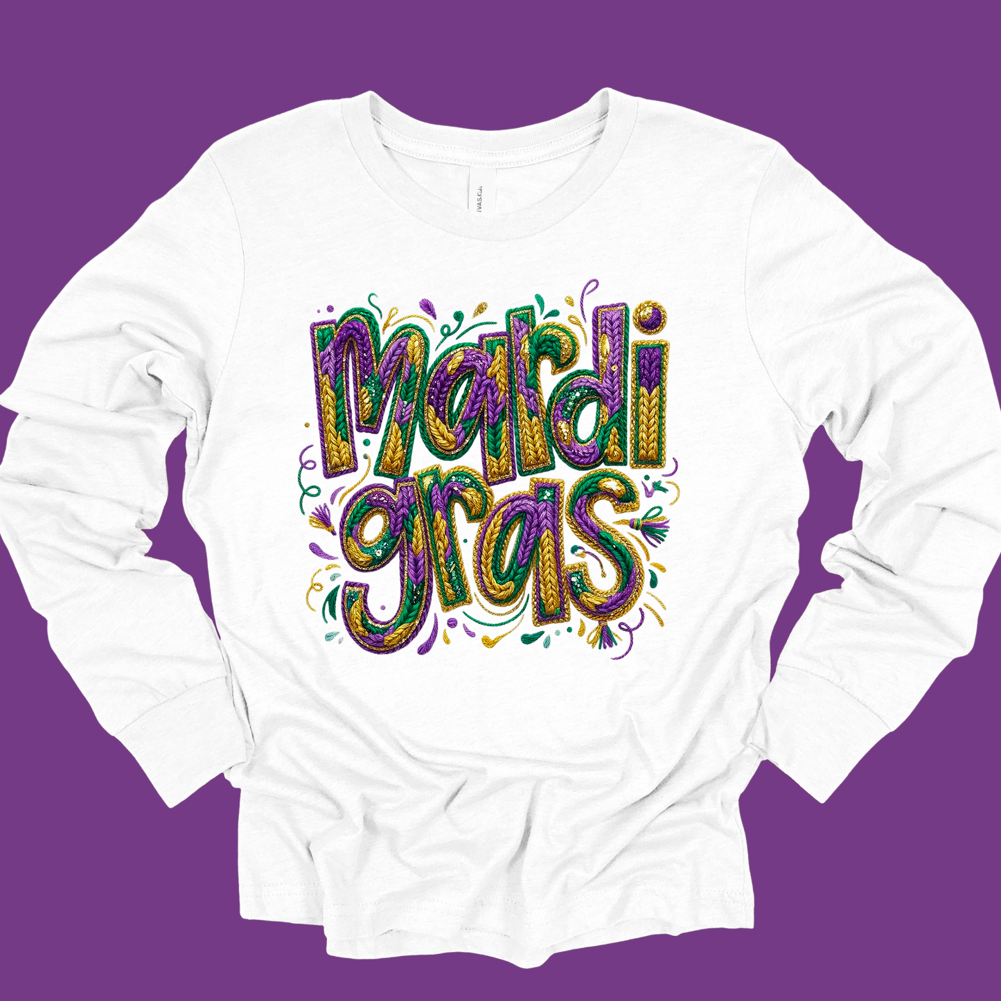 White long-sleeve shirt with 'Mardi Gras' text in colorful letters on a purple background