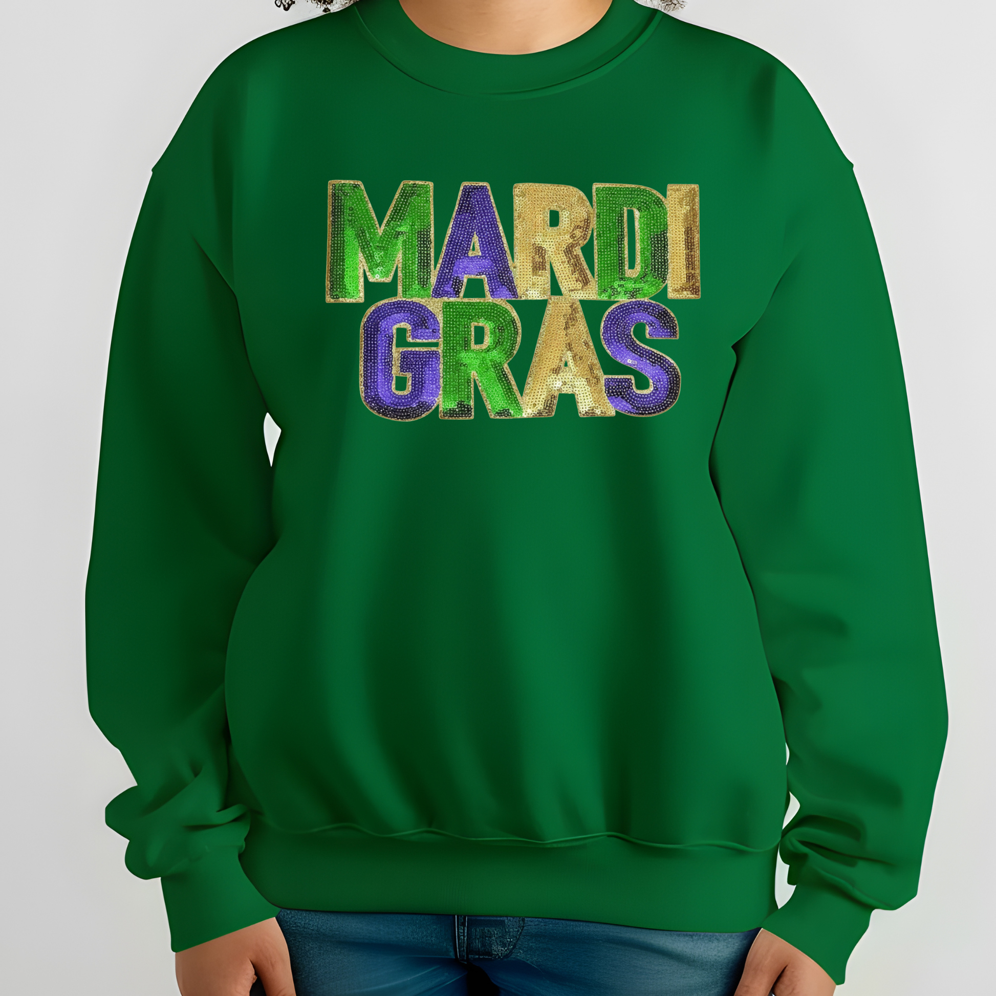 Green sweatshirt with 'MARDI GRAS' text in multicolor on a white background