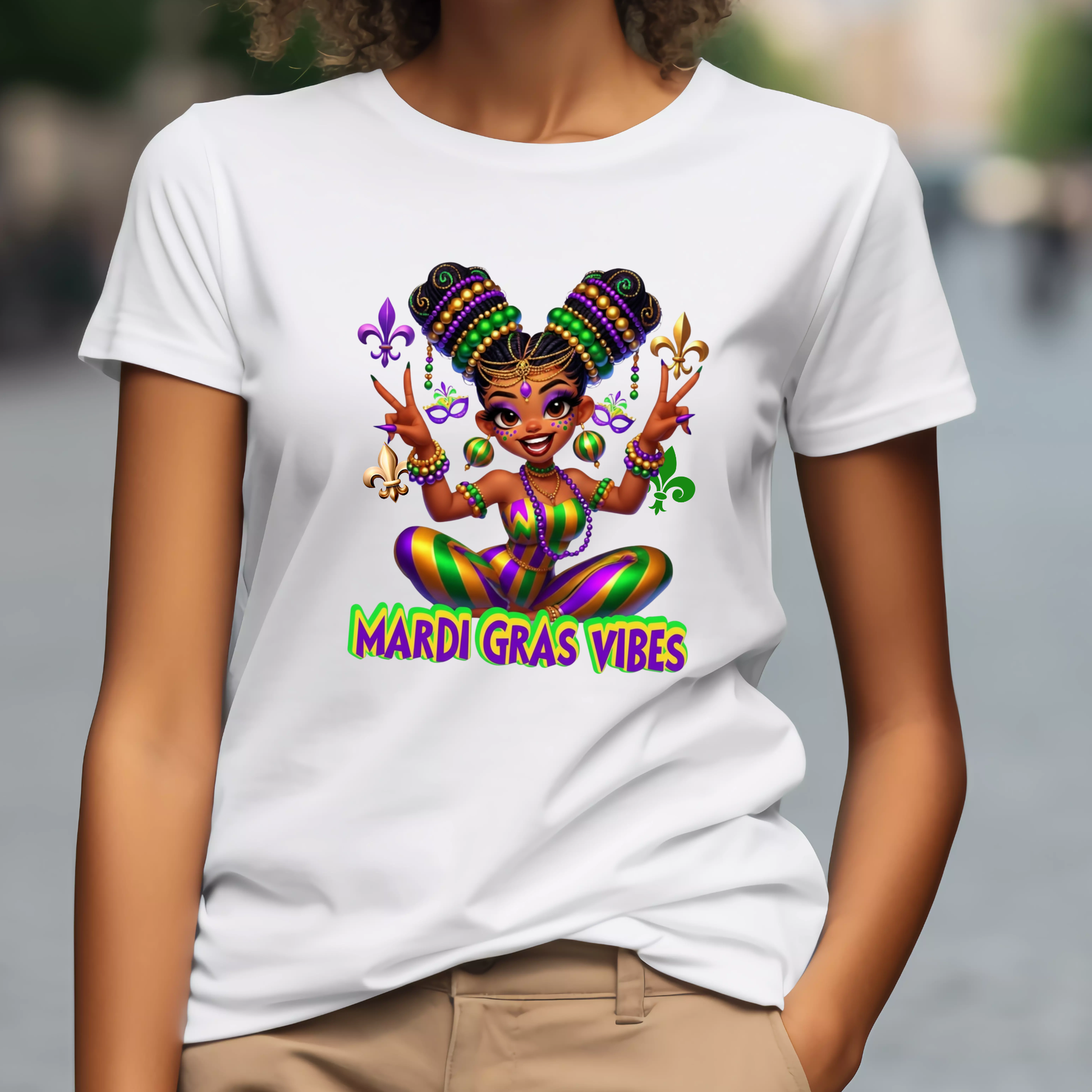 Person wearing a white t-shirt with Mardi Gras-themed design and text.