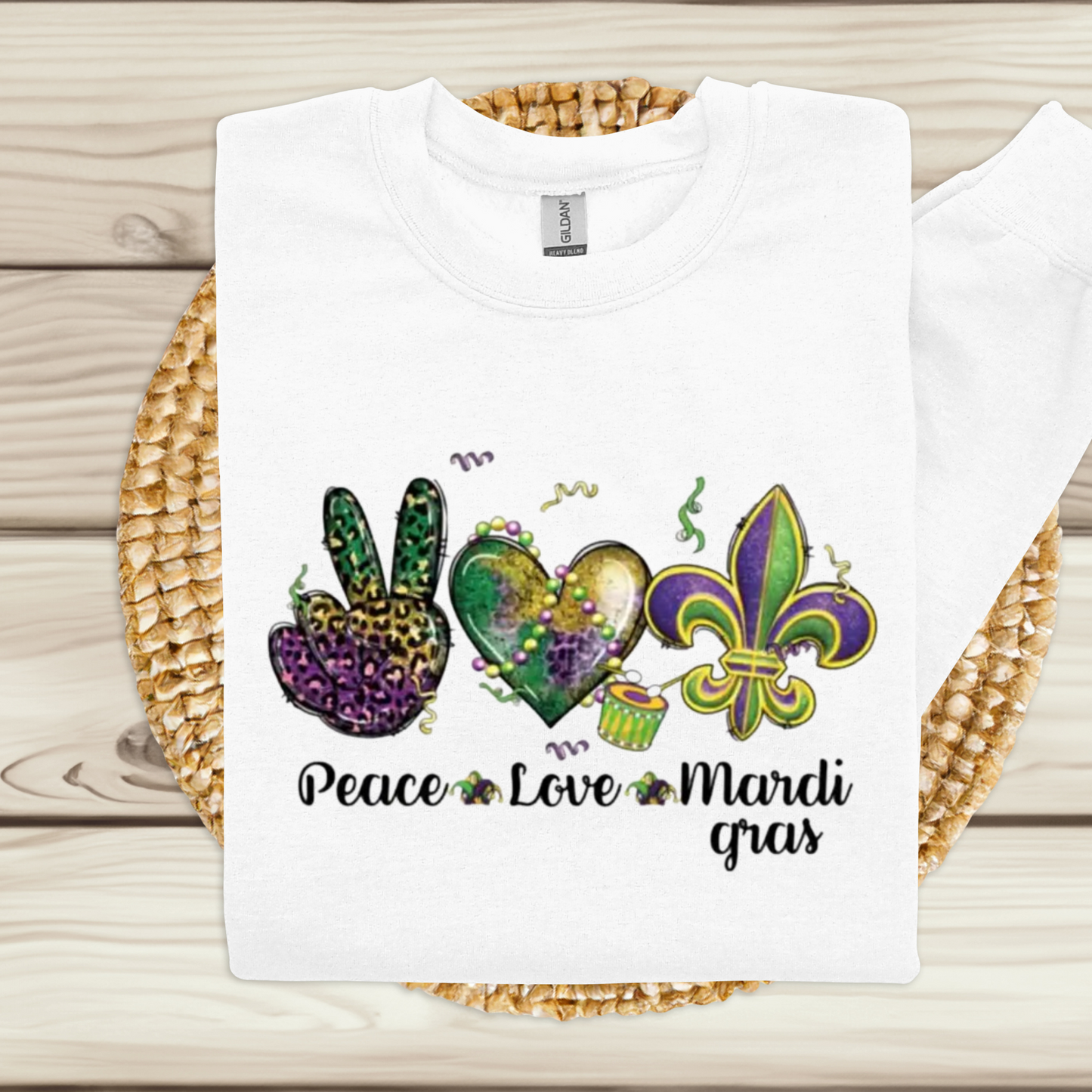Mardi Gras Sweater with the words "Peace Love Mardi Gras" on a White Soft Cotton Crewneck Folded Flat  Mardi Gras Sweatshirt sweater