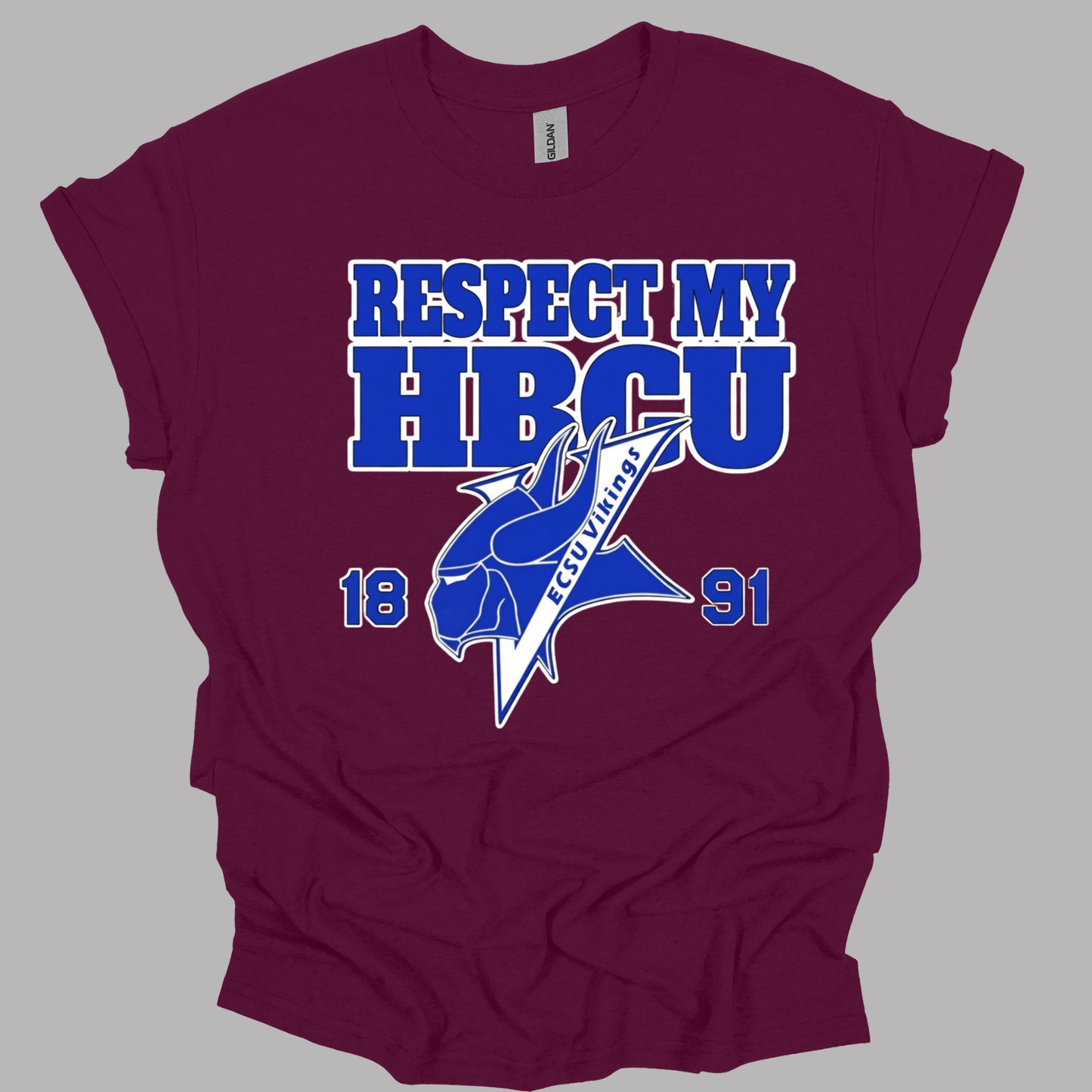 A maroon short-sleeve t-shirt with a graphic print that reads 'RESPECT MY HBCU' in blue and white, featuring a blue and white wolf mascot logo and the years '1891' on a gray background.