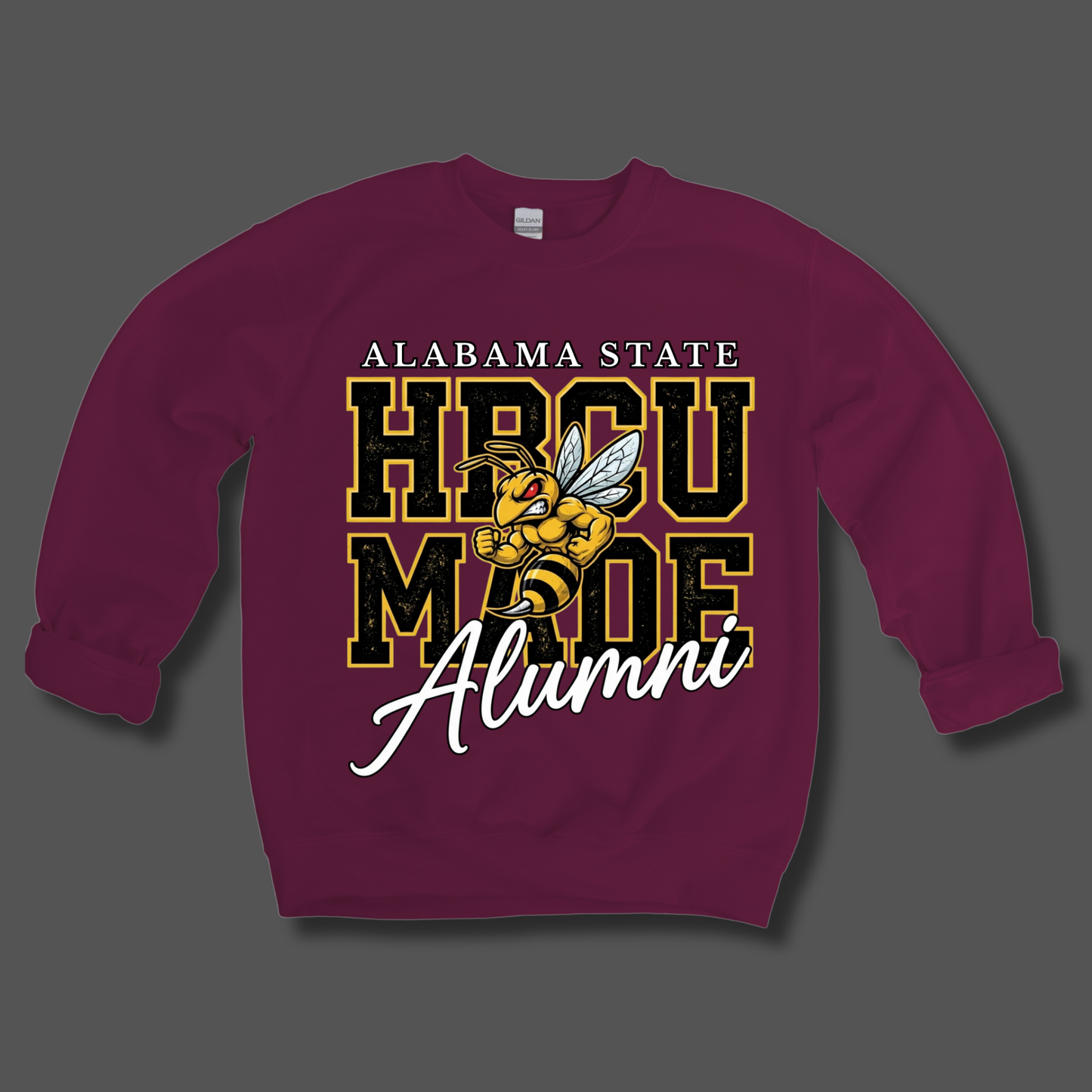 A maroon crewneck sweatshirt featuring a large graphic of a yellow and black hornet with the text 'Hornets Nation' in yellow and white, displayed on a solid gray background.