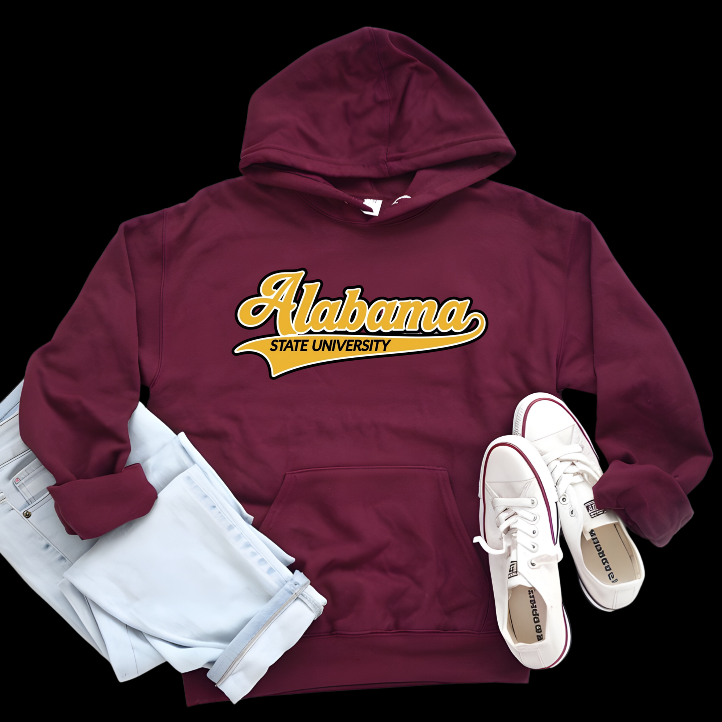 A maroon pullover hoodie with a large yellow and black hornet graphic and the words 'Hornets Nation' on the front, styled in a flat lay with light blue jeans and white sneakers on a black background.