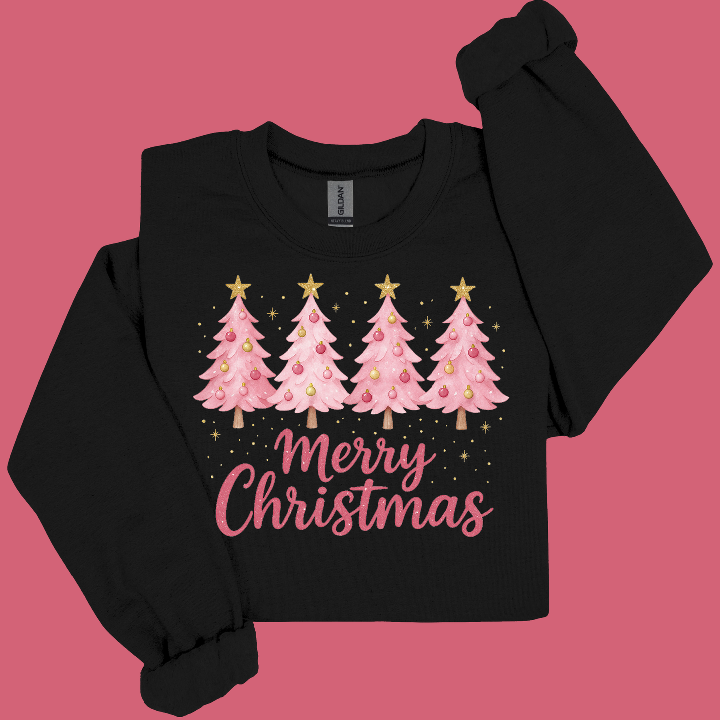 Black long-sleeve shirt with pink Christmas trees and 'Merry Christmas' text on a pink background
