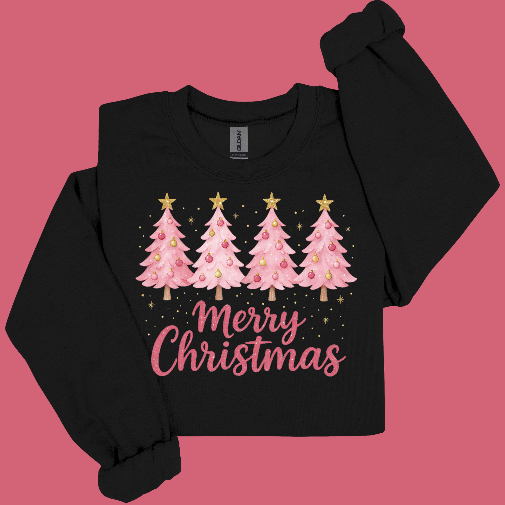 Black long-sleeve shirt with pink Christmas trees and 'Merry Christmas' text on a pink background