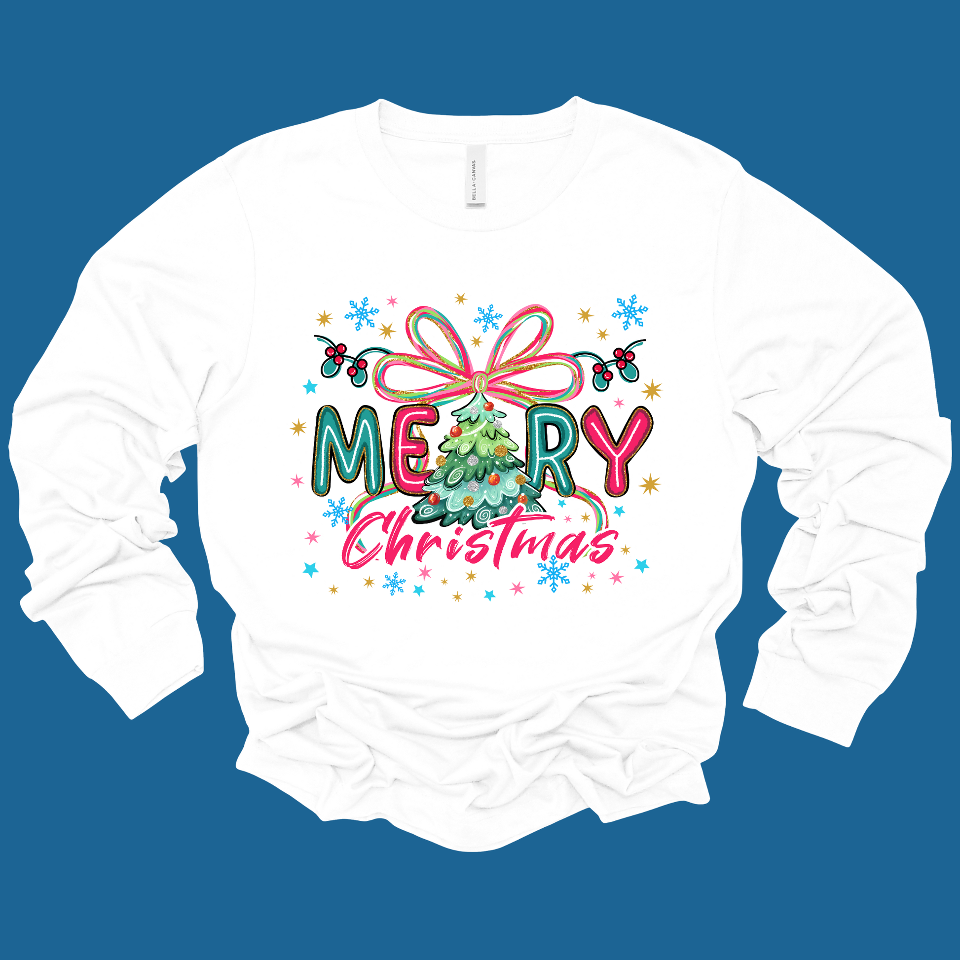 White long-sleeve shirt with colorful 'Merry Christmas' design on a blue background