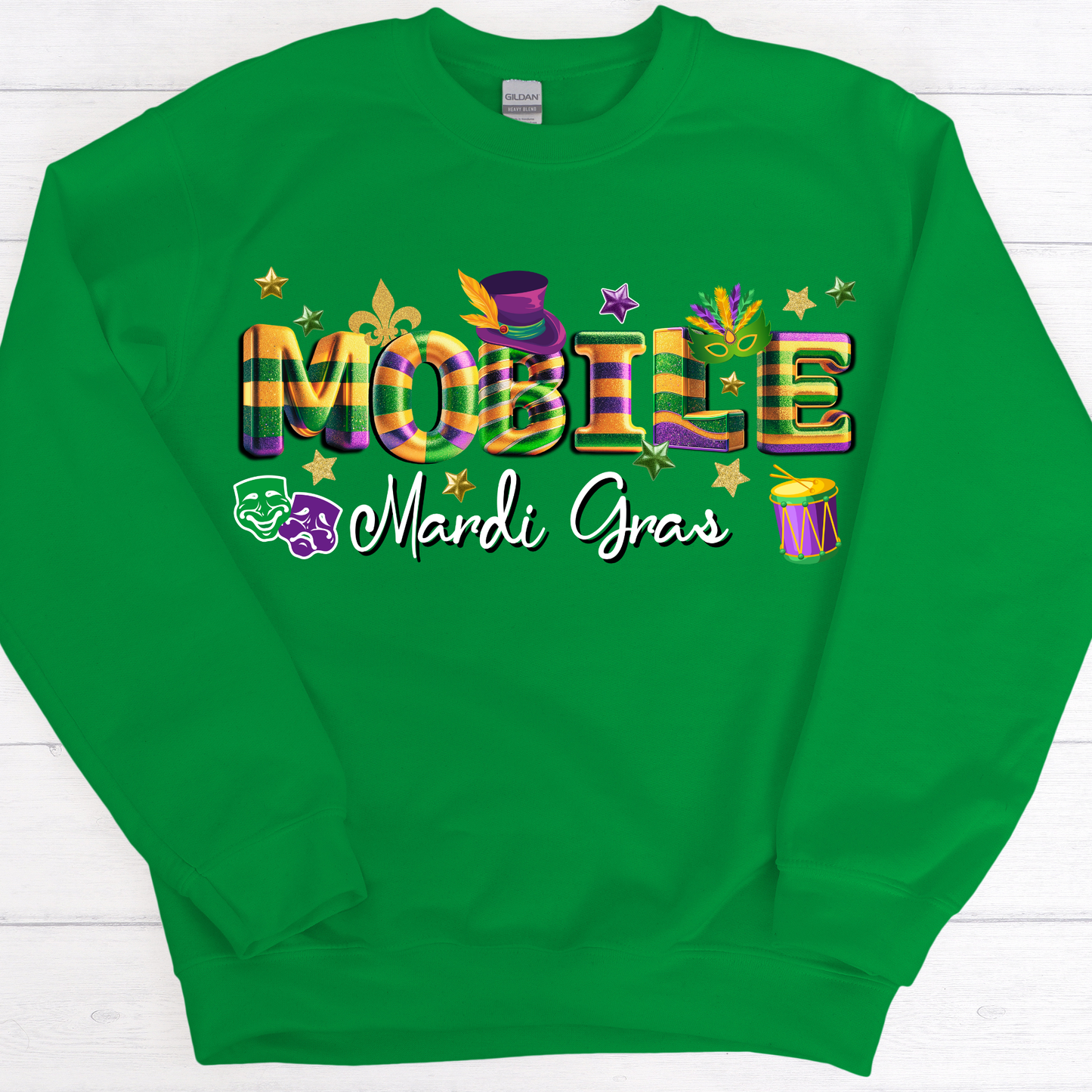 Green sweatshirt with Mardi Gras-themed text and graphics on a white background
