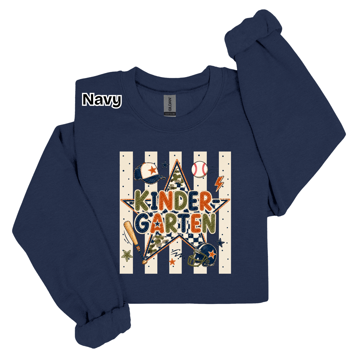 A navy blue long-sleeve t-shirt with a 'Kinder Garden' baseball-themed graphic on the front, featuring baseballs, bats, a star, and vertical stripes. The shirt is displayed flat against a white background with one sleeve folded over.
