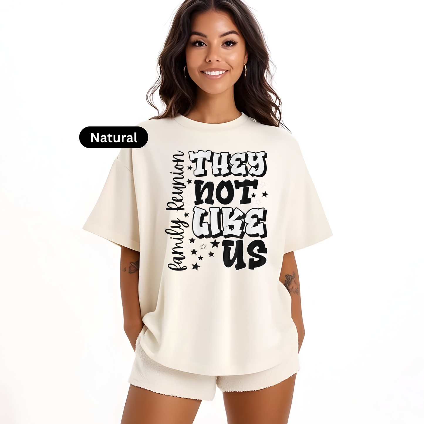Woman wearing a cream-colored t-shirt with text on a white background