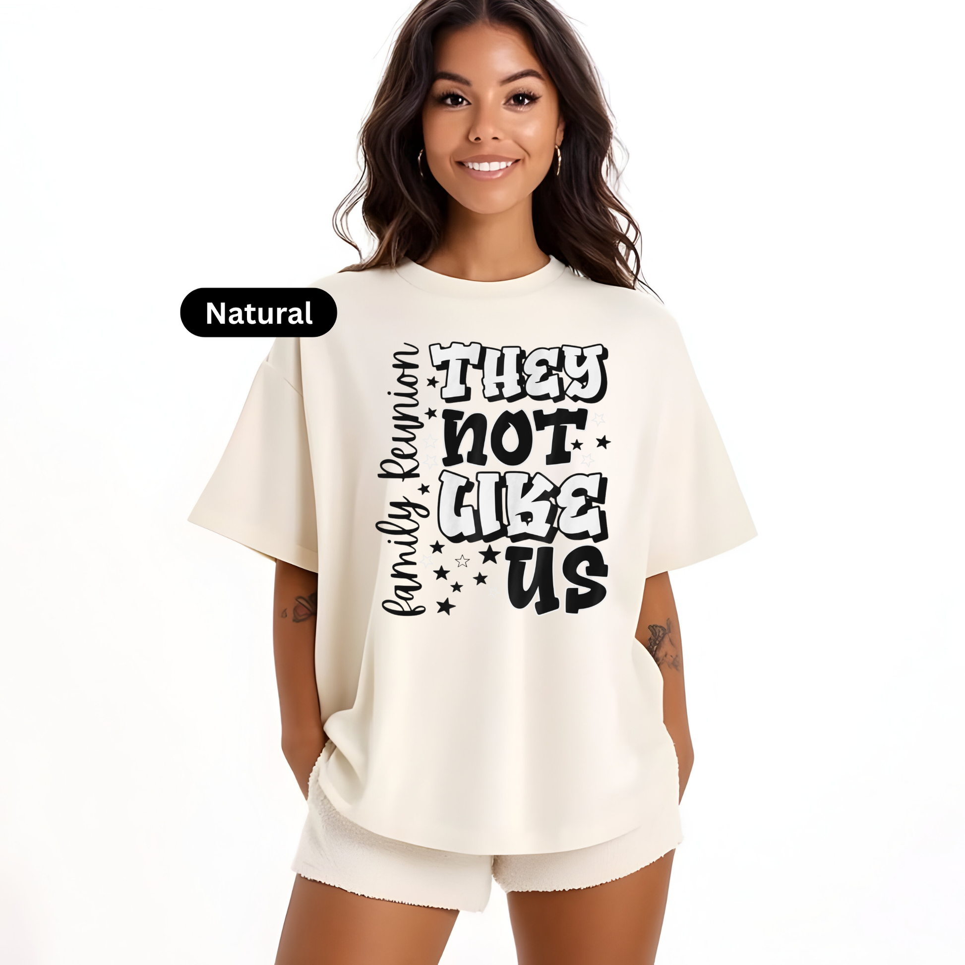 Woman wearing a cream-colored t-shirt with text on a white background