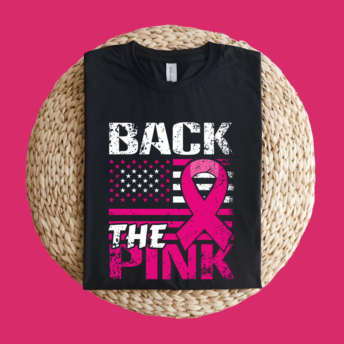 Black t-shirt with pink ribbon and text on a pink background