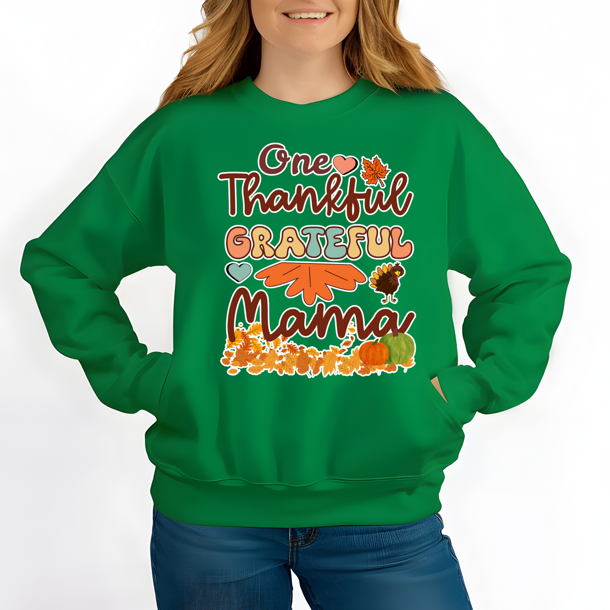Green sweatshirt with 'One Thankful Grateful Mama' text and fall-themed graphics worn by a person. Retro Thanksgiving Sweatshirt "One Thankful Mama" Cozy Fall Mom Crewneck