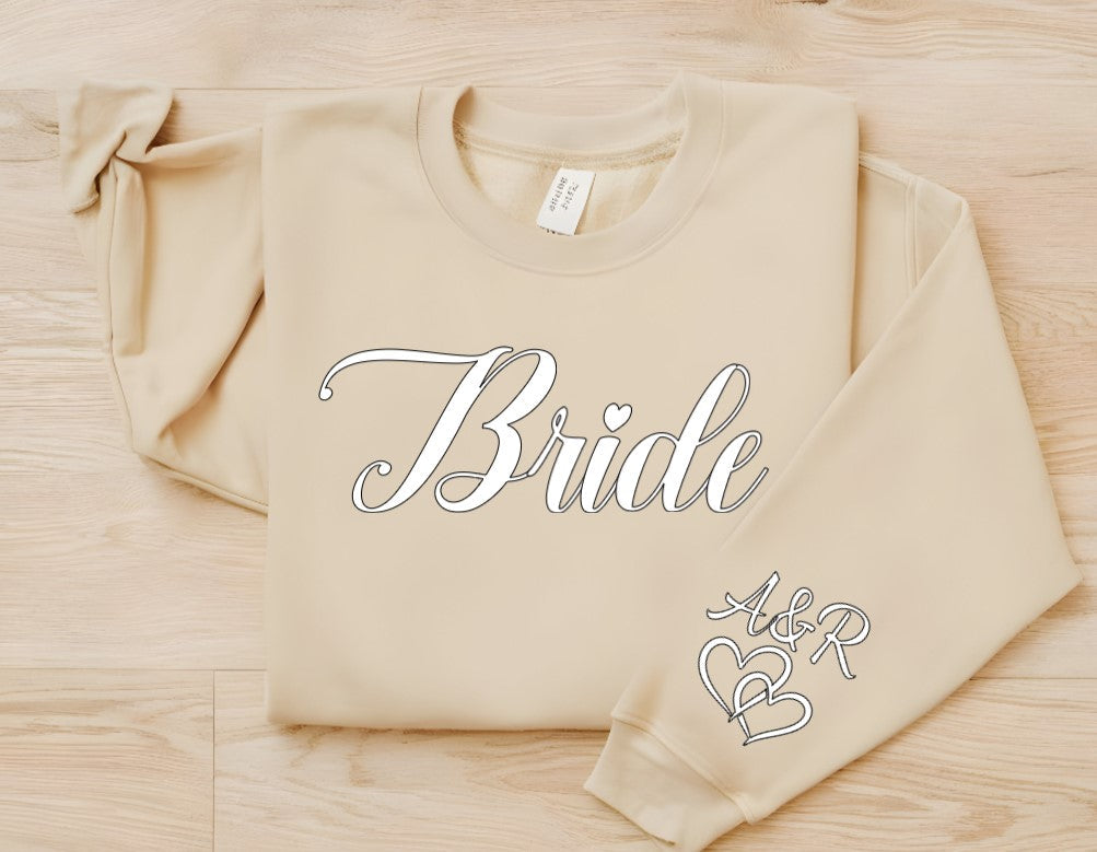 Personalize "Bride" with Couple Initials on Sleeve with Double Hearts Sand Crewneck Sweater
