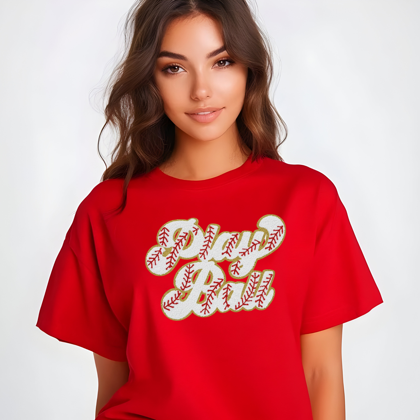 Woman wearing a red t-shirt with 'Baseball Mom' design on a white background