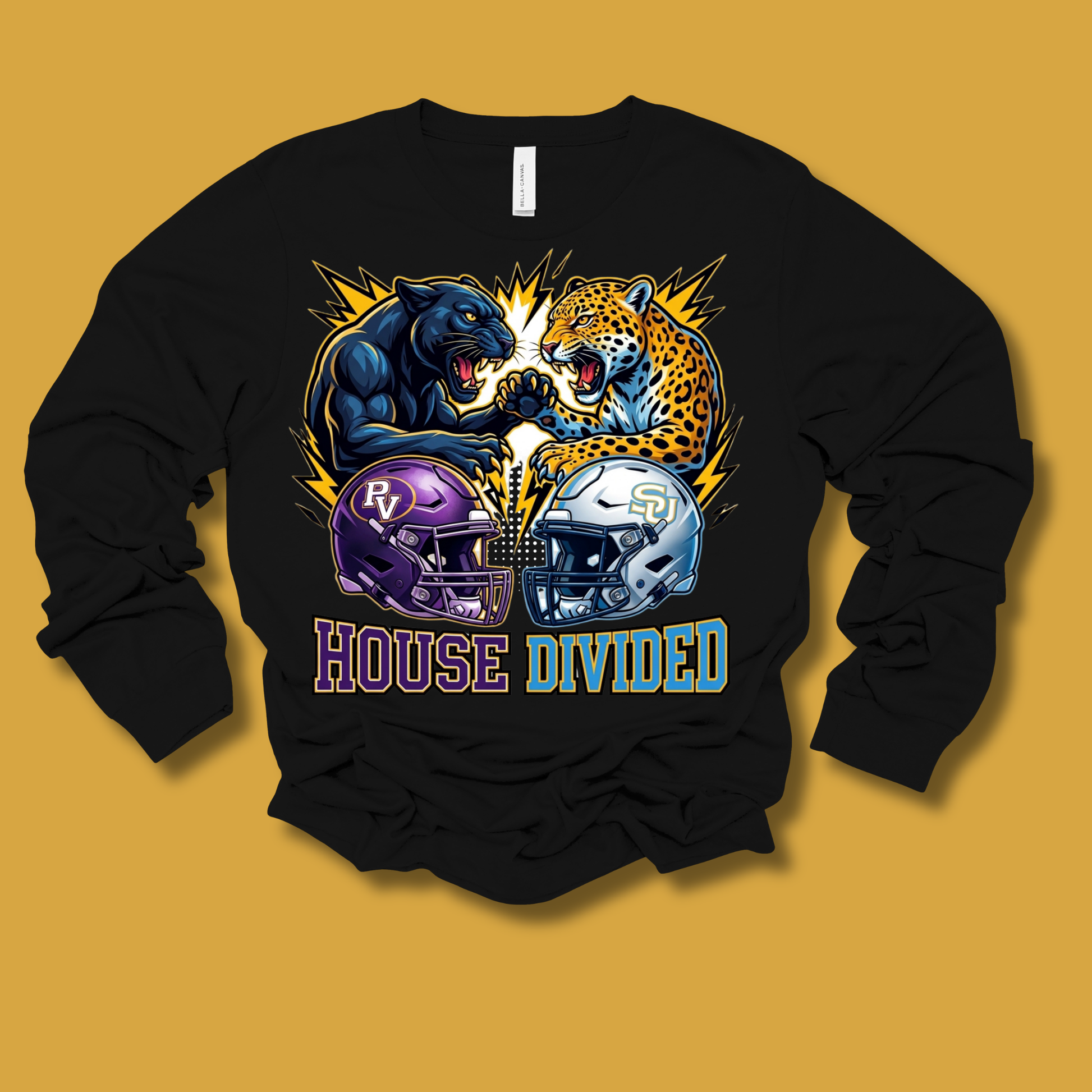 A black long-sleeve crewneck sweatshirt with a graphic print of a black bear, leopard, purple football helmet, and silver football helmet with the text 'HOUSE DIVIDED' underneath, displayed on a solid mustard yellow background.