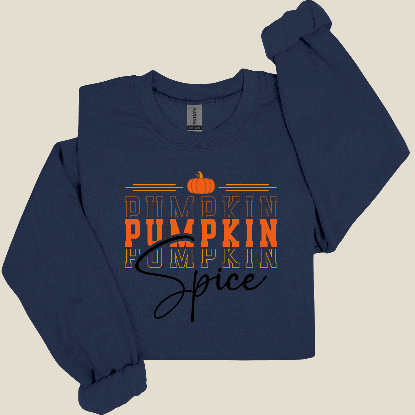 Navy blue long-sleeve shirt with 'Pumpkin Spice' text and pumpkin graphic on a beige background