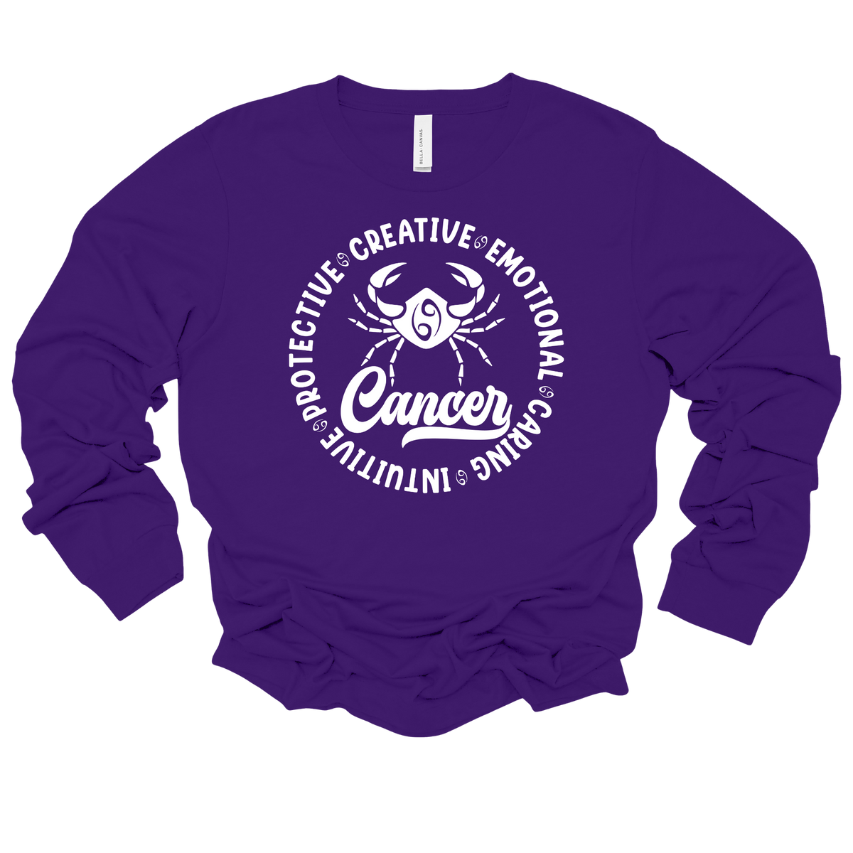A purple long-sleeve crewneck sweatshirt featuring a white graphic print of a Cancer zodiac sign with the word 'Cancer' and surrounding adjectives.