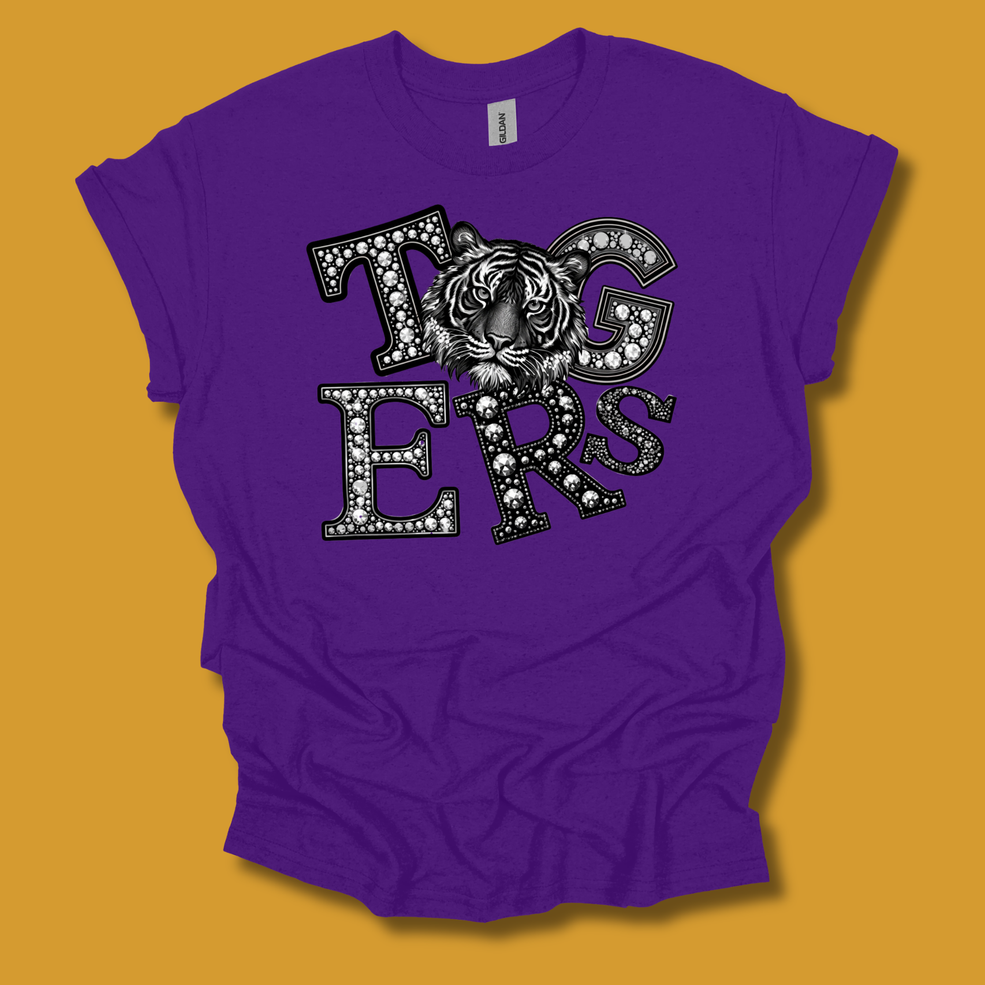 A purple short-sleeve t-shirt with a black and white graphic print of the word 'HORNET' featuring a detailed honeybee design, laid flat against a black background.