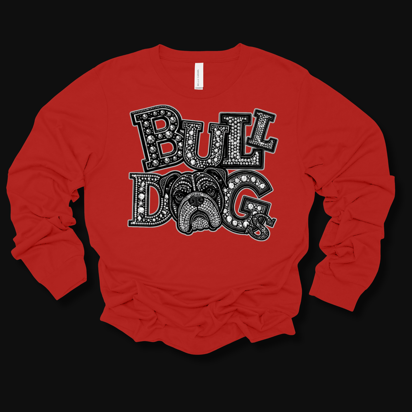 A red long-sleeve t-shirt with a black and white graphic reading 'BULLDOG' in a decorative, textured font, laid flat on a black background.