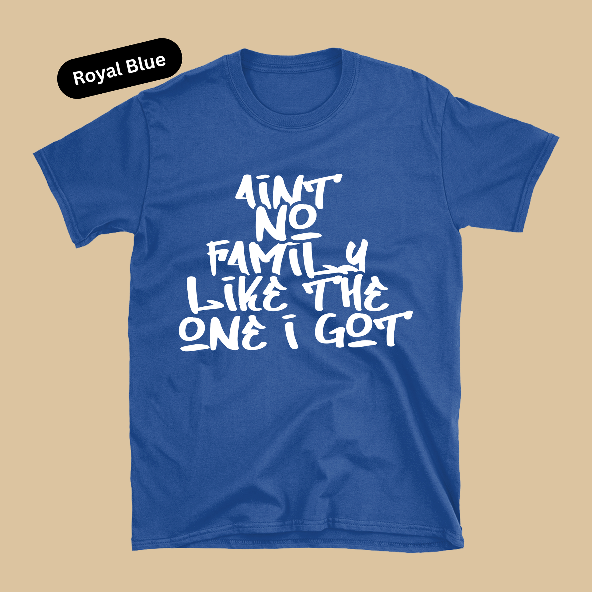 Blue t-shirt with white text on a beige background